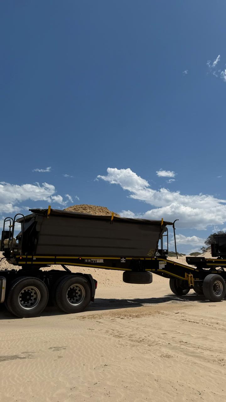 CWG bulk tipper trailer loaded with sand on dune operations site